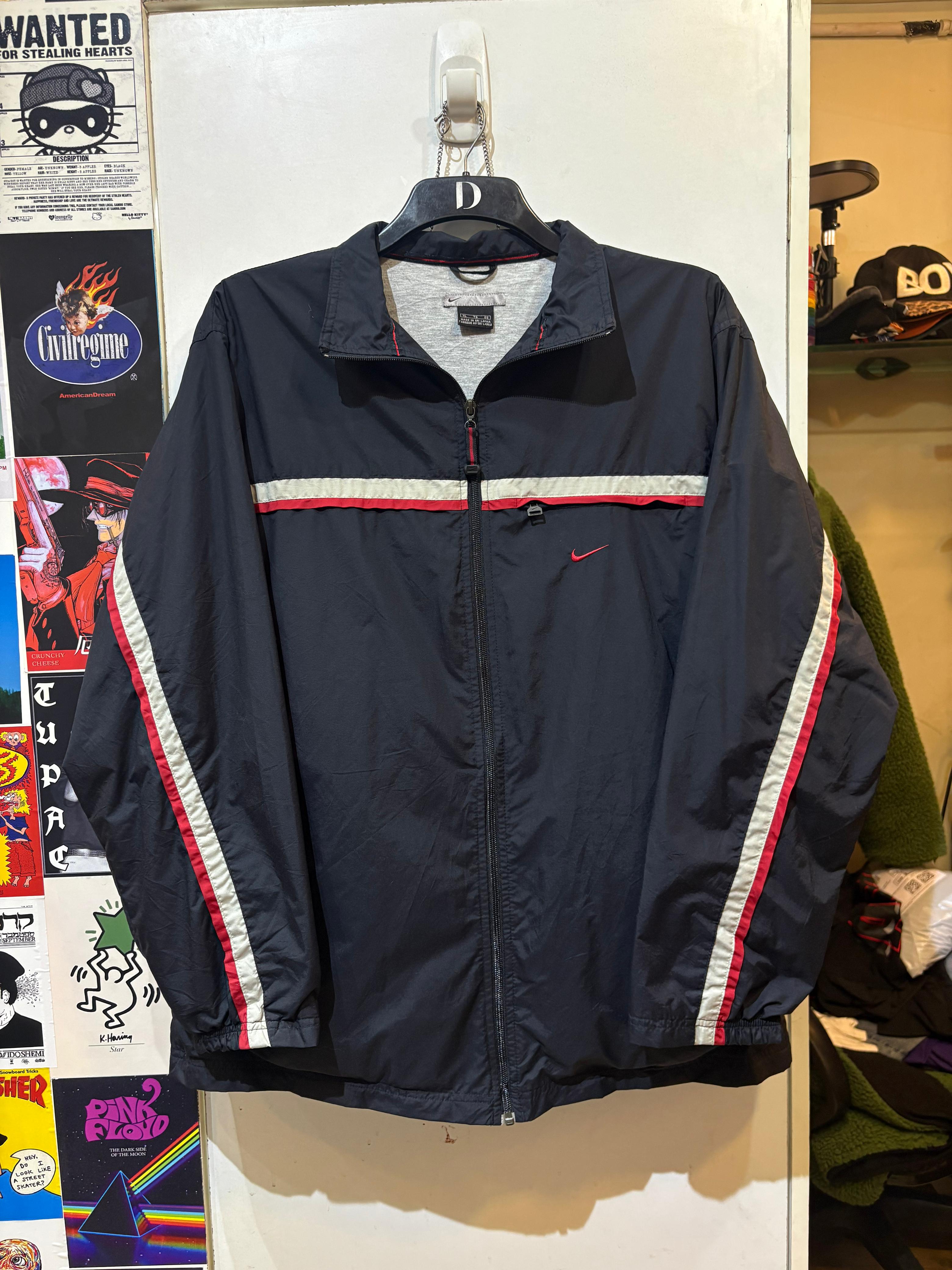 NIKE NAVY BLUE AND RED WIND CHEATER